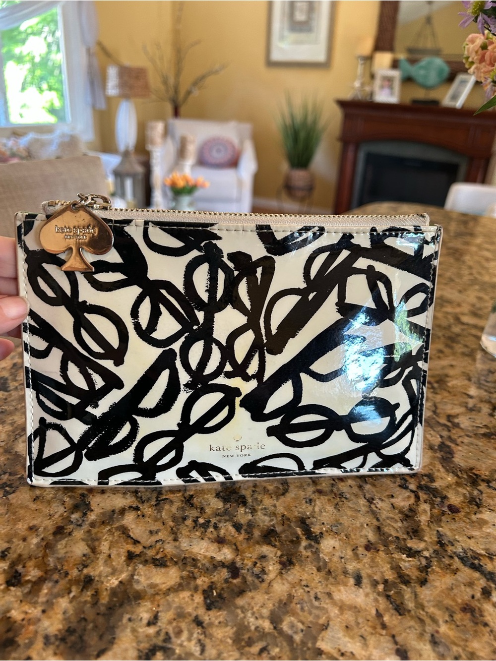 kate spade Literary pouch black and white patent gold charm